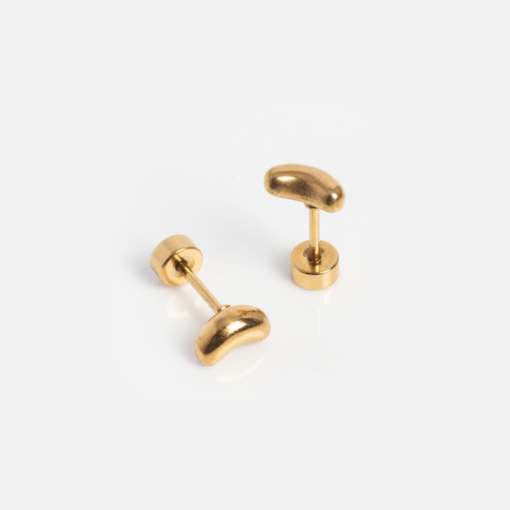 Pair of gold earrings on a white background