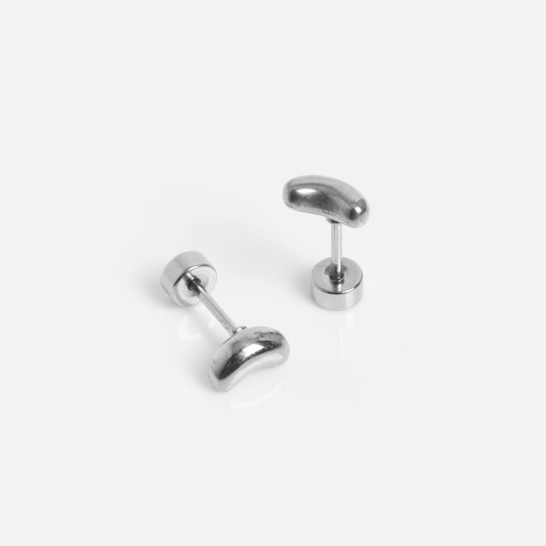 Pair of gold earrings on a white background