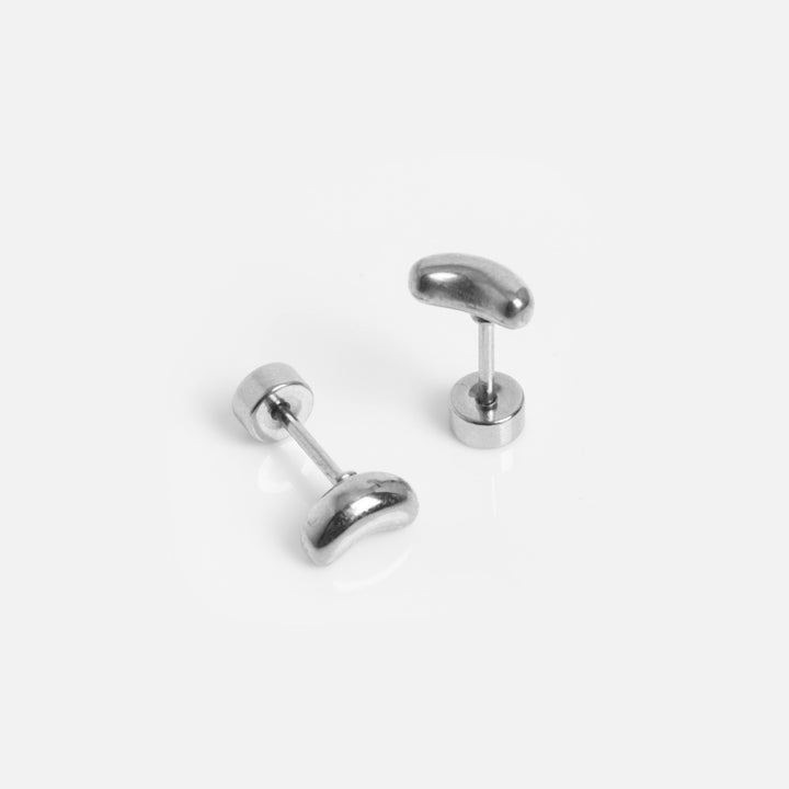 Pair of gold earrings on a white background