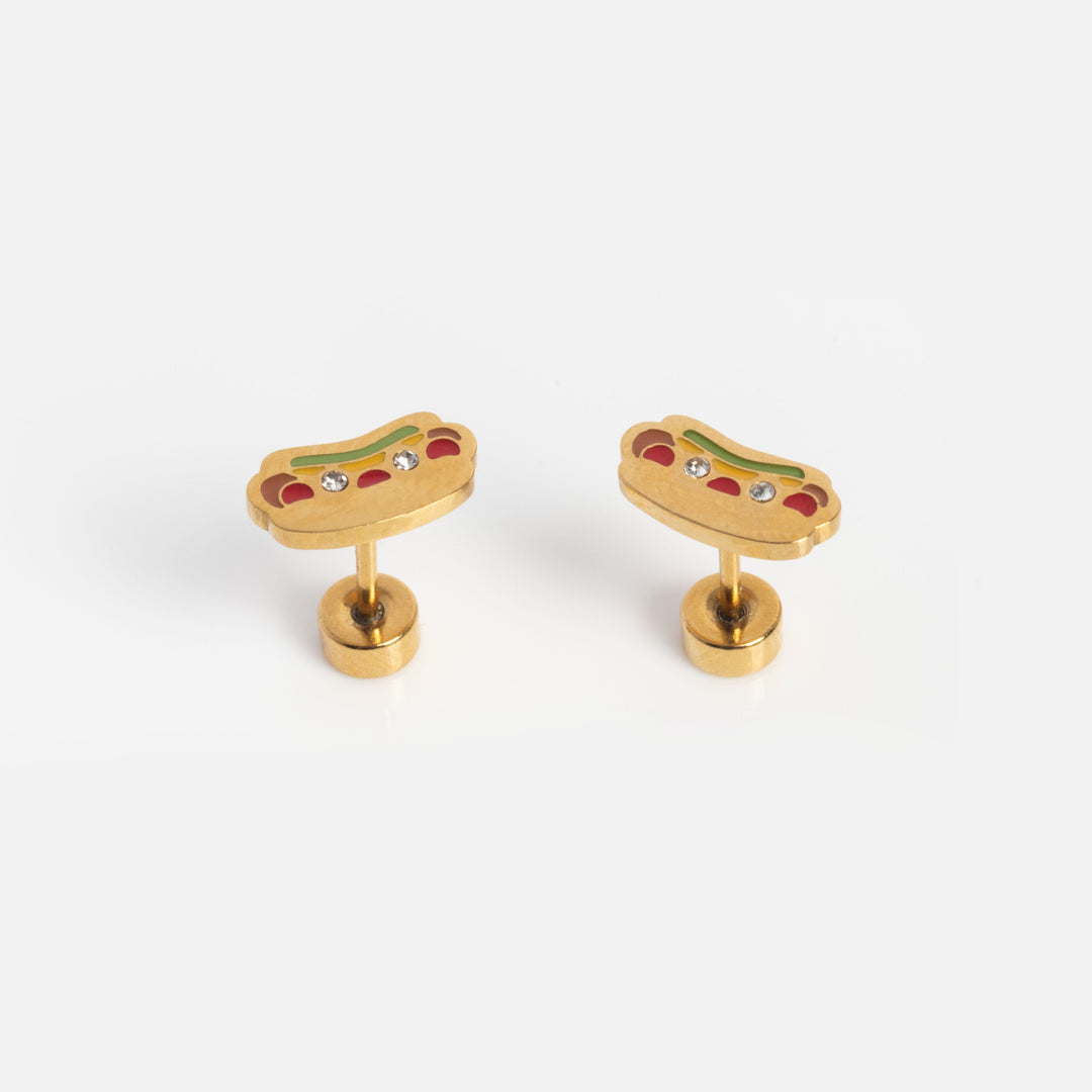 Pair of gold cufflinks with colorful gemstones on a white background