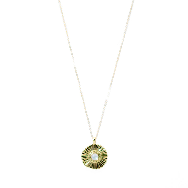 Necklace with a gold pendant on a white background